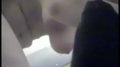 Bushy pussy and erected nips on the in changing room