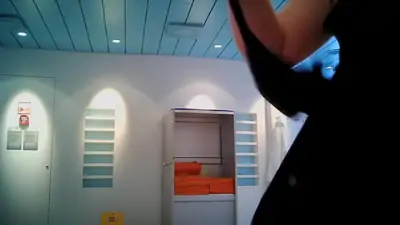 Mature fem changes in changing room showing back and tits