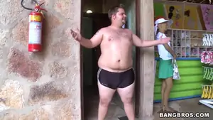 Two horny guys walking along brazilian beach