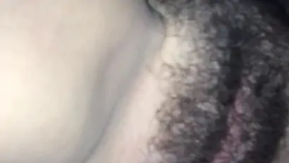 Shooting another load on her hairy cunt