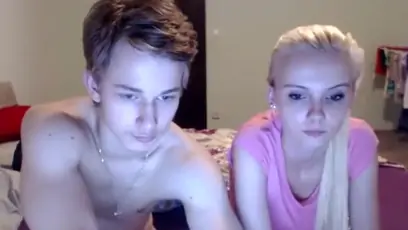 Perky blonde is giving a hand job