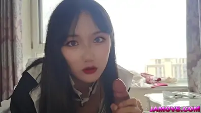 Sweet girl doing handjob