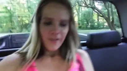 Chick masturbates in the truck