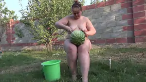 A fat girl puts her ass in a different food on the street