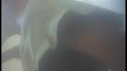 A girl wearing white skirt lets everybody have a great upskirt view in the changing room