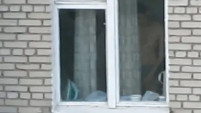 Hot brunette chick window peek