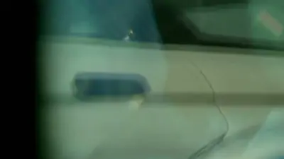 A films the crotch of a girl getting into her car