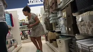Filming her ass while she works