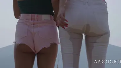 Julia and marina wetting jeans on bare foot hike