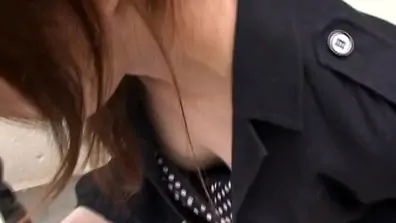 Nice down blouse of a cute asian babe wearing black bra