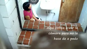 Fat ass woman doing her business in the bathroom