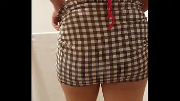 Mature big tits in mini skirt
